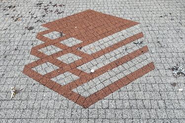 Firemní logo vyskládané z dlažebních kostek RUBELIT®